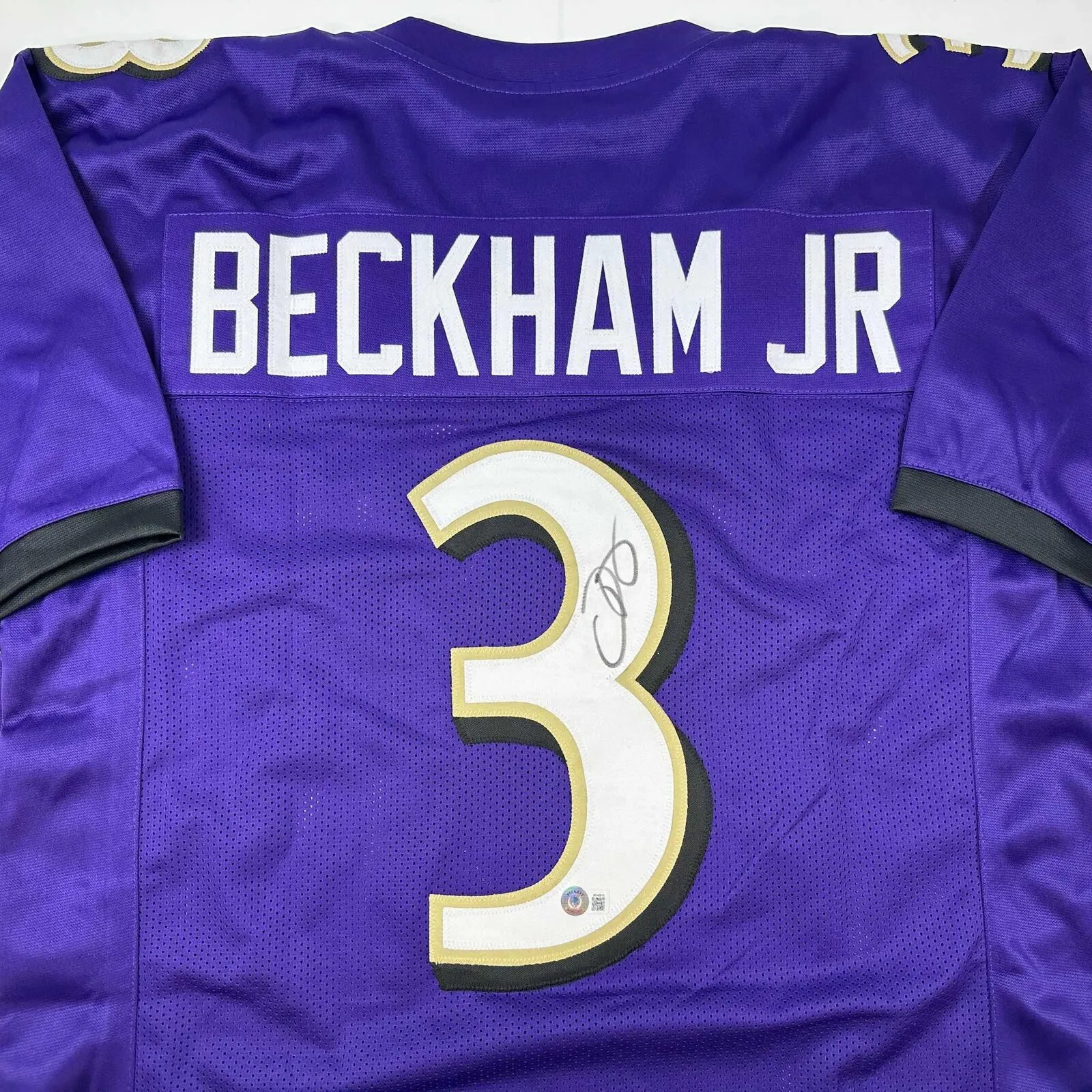Autographed/Signed Odell Beckham Jr. Baltimore Purple Jersey Beckett BAS COA
