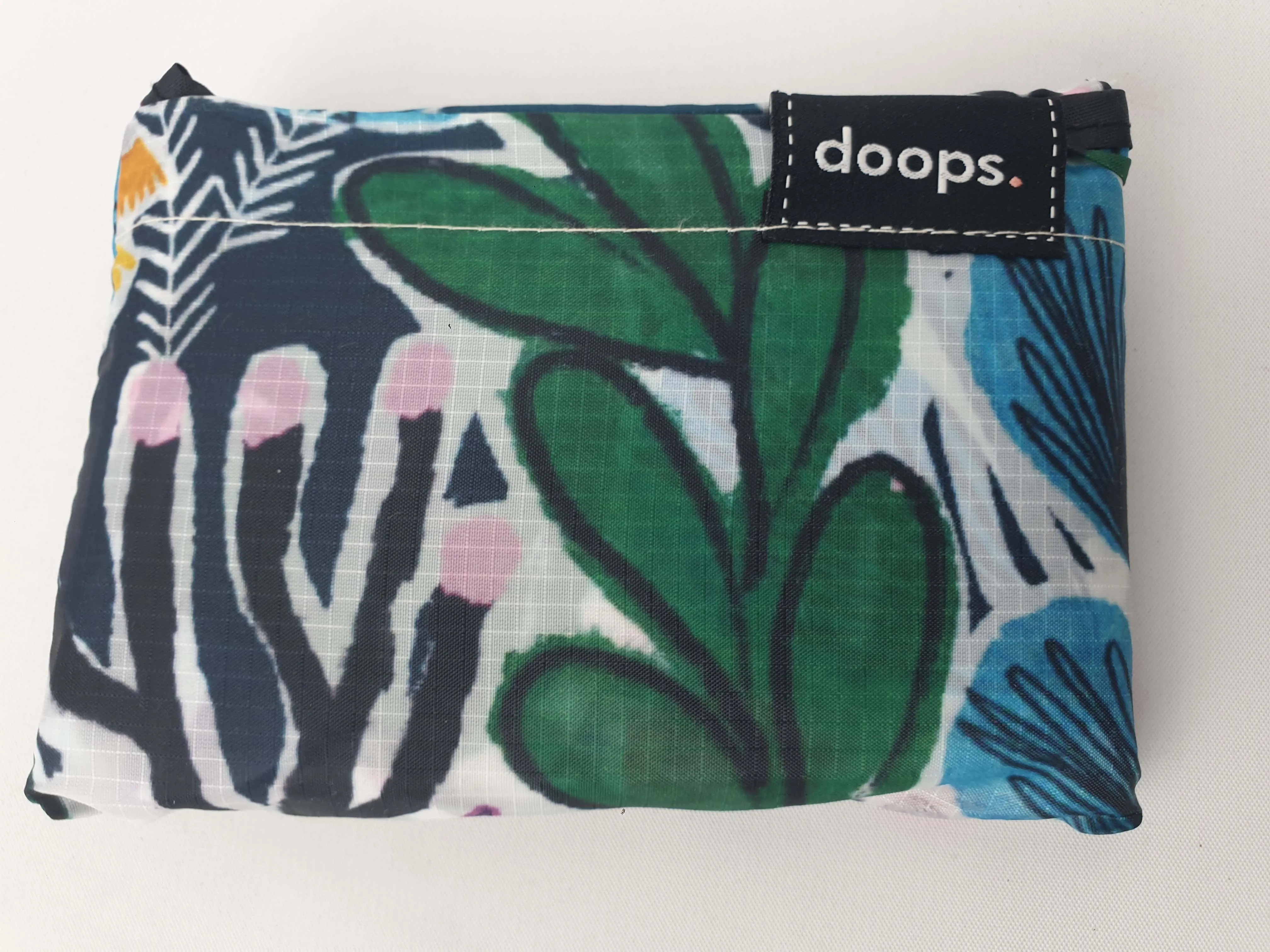 Doops deep green-based unique print compact shopping bag