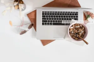 Granola & Bunny Tail ontop of Laptop. Digital Image.