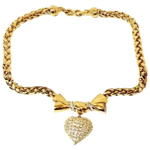 MINT. Vintage Nina Ricci golden chain statement necklace with ribbon bow and crystal stone heart pendant top. Perfect vintage jewelry